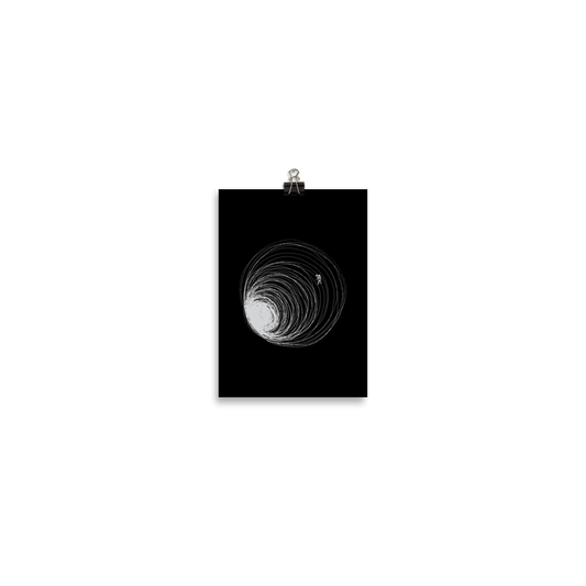 A big black hole with an astronaut floating around as if being sucked into it. A minimalist art perfect for those who love space.