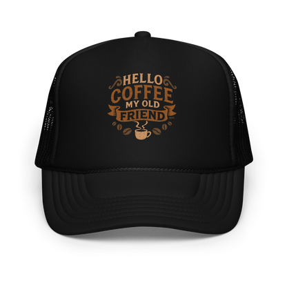 Vintage-style graphic featuring the phrase “Hello Coffee My Old Friend” in bold brown lettering, surrounded by decorative flourishes, coffee beans, and a steaming coffee cup.