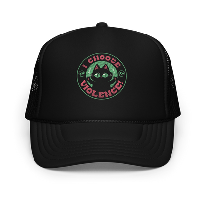 The image features a black cartoon-like cat with large, bright eyes and pointed ears, with a defiant look on its face. The cat is centered within a circular border. Surrounding the cat, the text reads 'I CHOOSE VIOLENCE!' in bold, playful font. There are also small skull illustrations flanking the cat on either side, adding a dark yet humorous tone to the design.