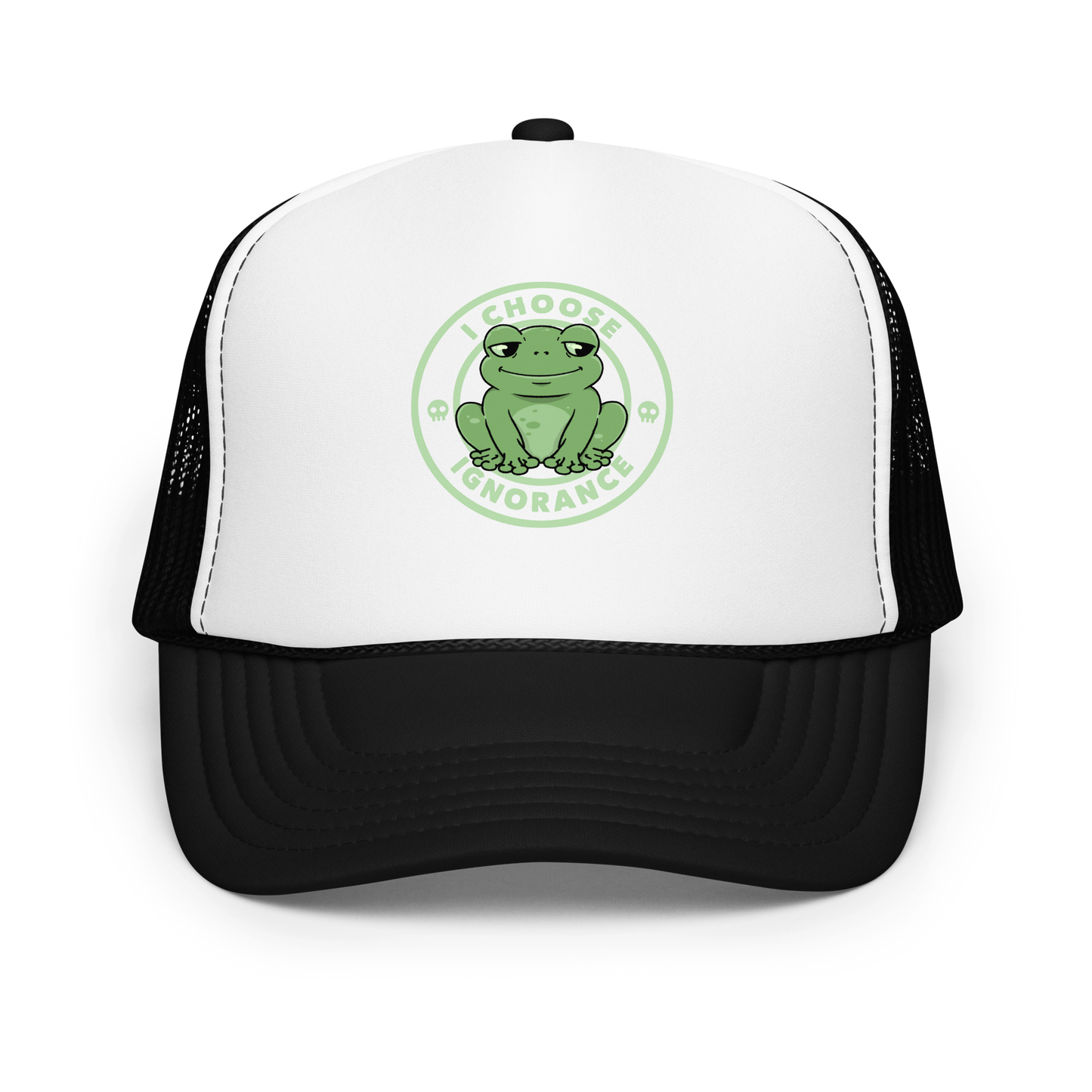 The image shows a cartoonish green frog with a sly smile, sitting with legs splayed out. Around it, the phrase 'I CHOOSE IGNORANCE' is written in bold letters. Two small skull designs are included, one on each side of the frog. The style is playful and ironic, blending elements of humor and rebellion.