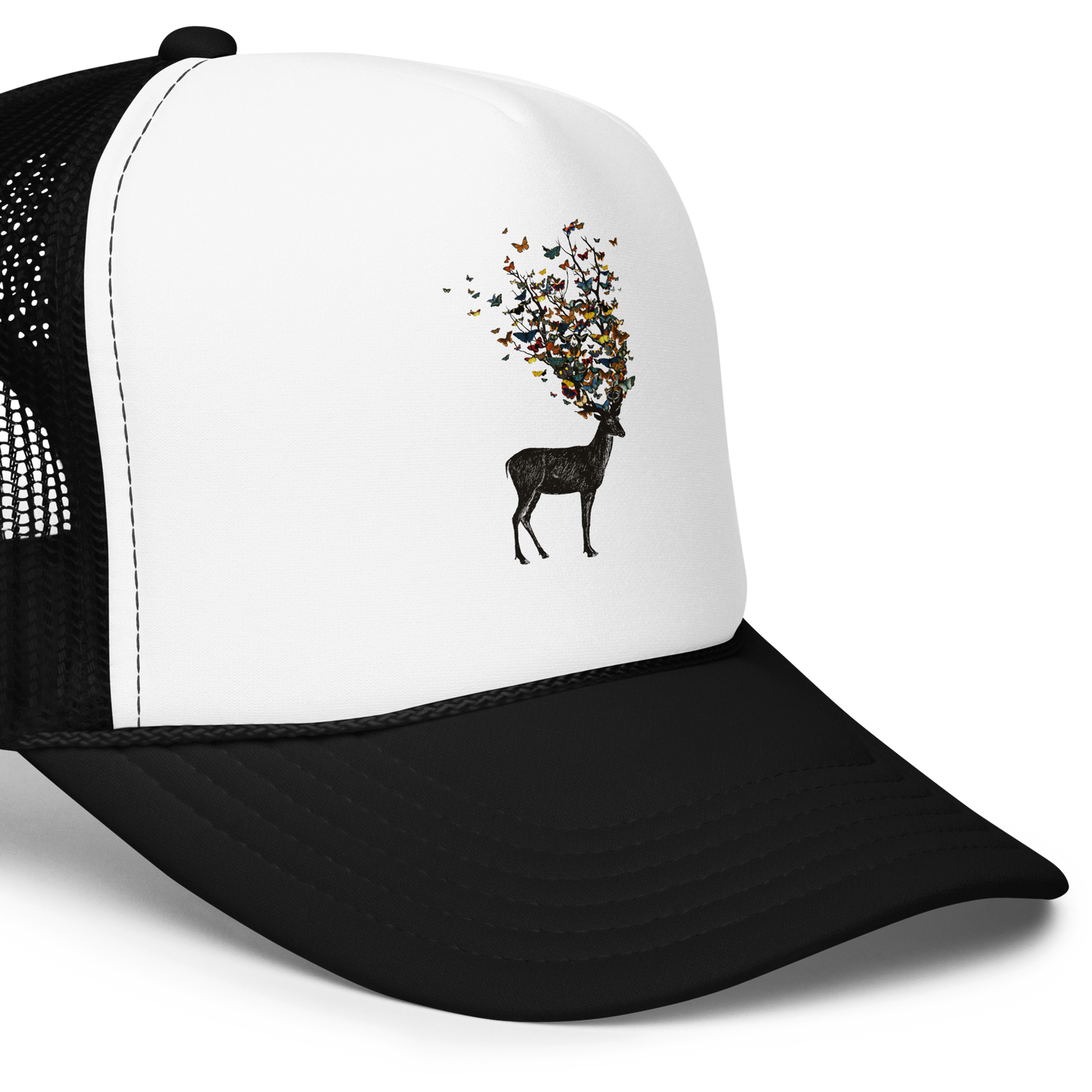 The image depicts a dark, silhouetted deer standing on a neutral background. Instead of branches, its antlers transform into a swirling cloud of vibrant, colorful butterflies that extend upwards and outward. The mix of organic and ethereal elements creates a captivating and whimsical visual contrast.