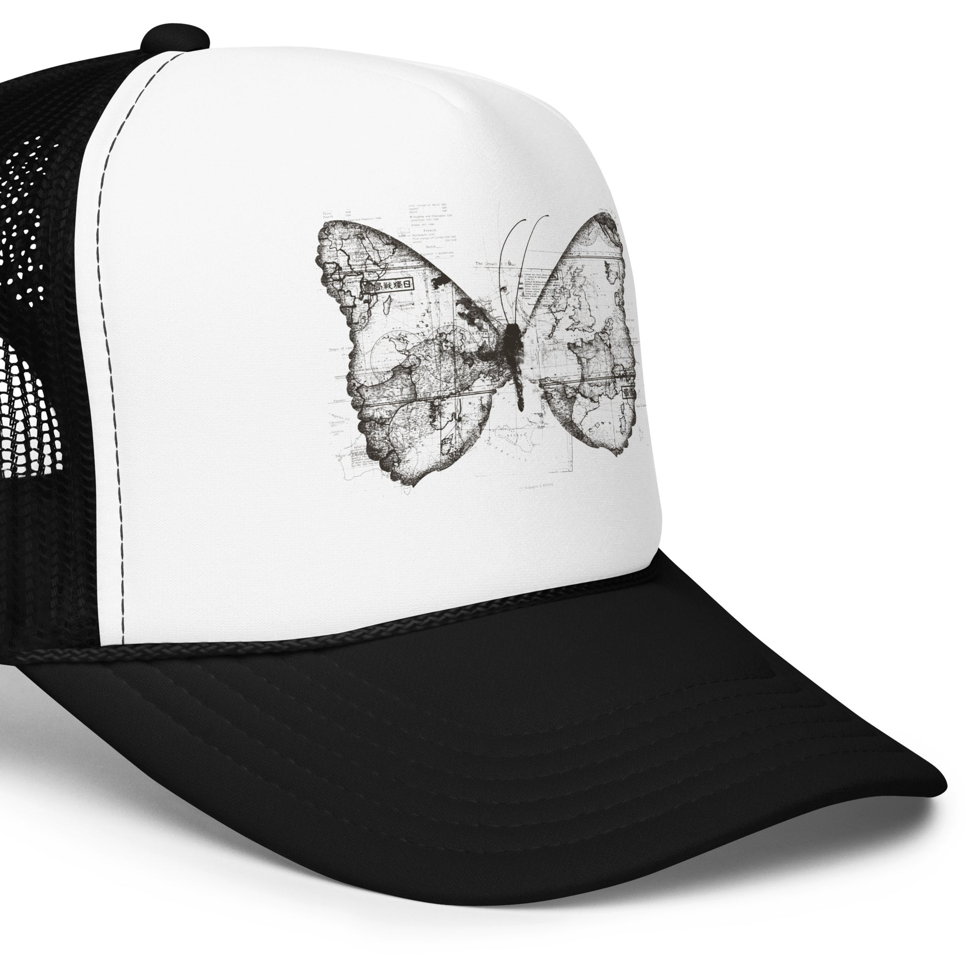 The image features a black and white butterfly where the wings are created using ancient world map designs. The maps overlay in intricate detail, blending geographical elements with the organic shape of the butterfly. Surrounding the butterfly are faint outlines of text and additional geographic features, creating a vintage and exploratory vibe.