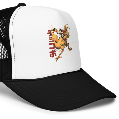 A stylized cartoon illustration of a confident cat wearing a cape and crown while riding a large yellow bird at full speed, with dynamic motion lines and Japanese writing in the background.