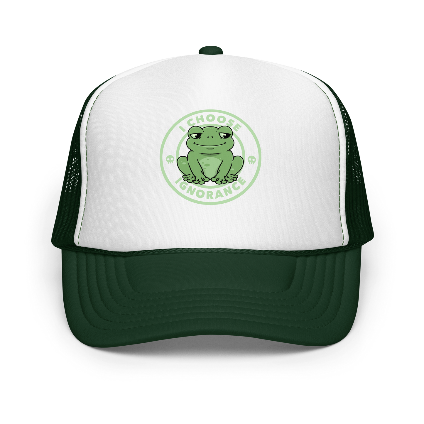The image shows a cartoonish green frog with a sly smile, sitting with legs splayed out. Around it, the phrase 'I CHOOSE IGNORANCE' is written in bold letters. Two small skull designs are included, one on each side of the frog. The style is playful and ironic, blending elements of humor and rebellion.