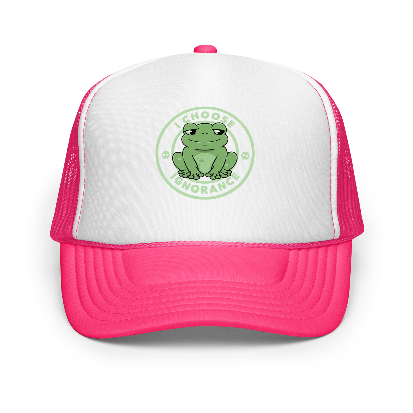 The image shows a cartoonish green frog with a sly smile, sitting with legs splayed out. Around it, the phrase 'I CHOOSE IGNORANCE' is written in bold letters. Two small skull designs are included, one on each side of the frog. The style is playful and ironic, blending elements of humor and rebellion.