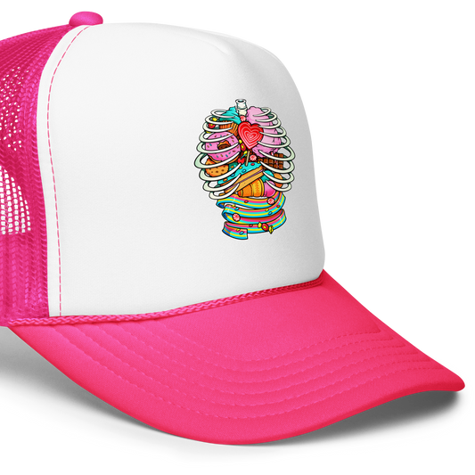 This vibrant design features a detailed, cartoonish human ribcage with various colorful candies and sweets filling the cavity. The sweets include a heart-shaped lollipop, cookies, cotton candy, chocolate bars, ice cream, donuts, and colorful candy strips. The style is reminiscent of pop art with bold lines and vivid colors, making it visually striking and playful.