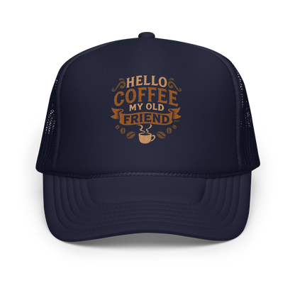 Vintage-style graphic featuring the phrase “Hello Coffee My Old Friend” in bold brown lettering, surrounded by decorative flourishes, coffee beans, and a steaming coffee cup.