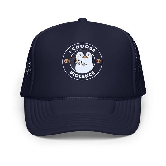 A cartoon-style penguin with a slightly menacing expression holds a large knife. It is surrounded by the words 'I CHOOSE VIOLENCE' in bold uppercase letters. There are two small orange skulls flanking the penguin. The overall design is circular and features contrasting colors for a dramatic effect.