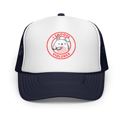 A cute white cartoon bunny with a pink belly stands holding a large kitchen knife in one paw. Surrounding the bunny is a red circular border with the words 'I CHOOSE VIOLENCE'. Small skull icons are on either side of the circle. The overall tone is a mix of adorable and ironic humor.