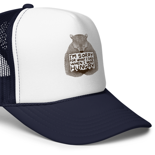 The image shows a humorous, detailed illustration of a bear, drawn in a hand-drawn style, holding a sign that reads 'I'm sorry for what I said when I was hungry.' The bear appears to be apologizing in a comical, endearing manner, making it a relatable and light-hearted design.