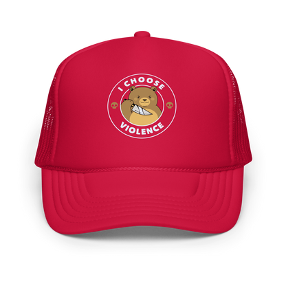 A cartoon-style image features a cute, determined-looking teddy bear holding a knife, with an expression of mischief. The bear is surrounded by the bold text 'I CHOOSE VIOLENCE' and accompanied by small skull icons on either side, adding a humorous and ironic twist to the design.