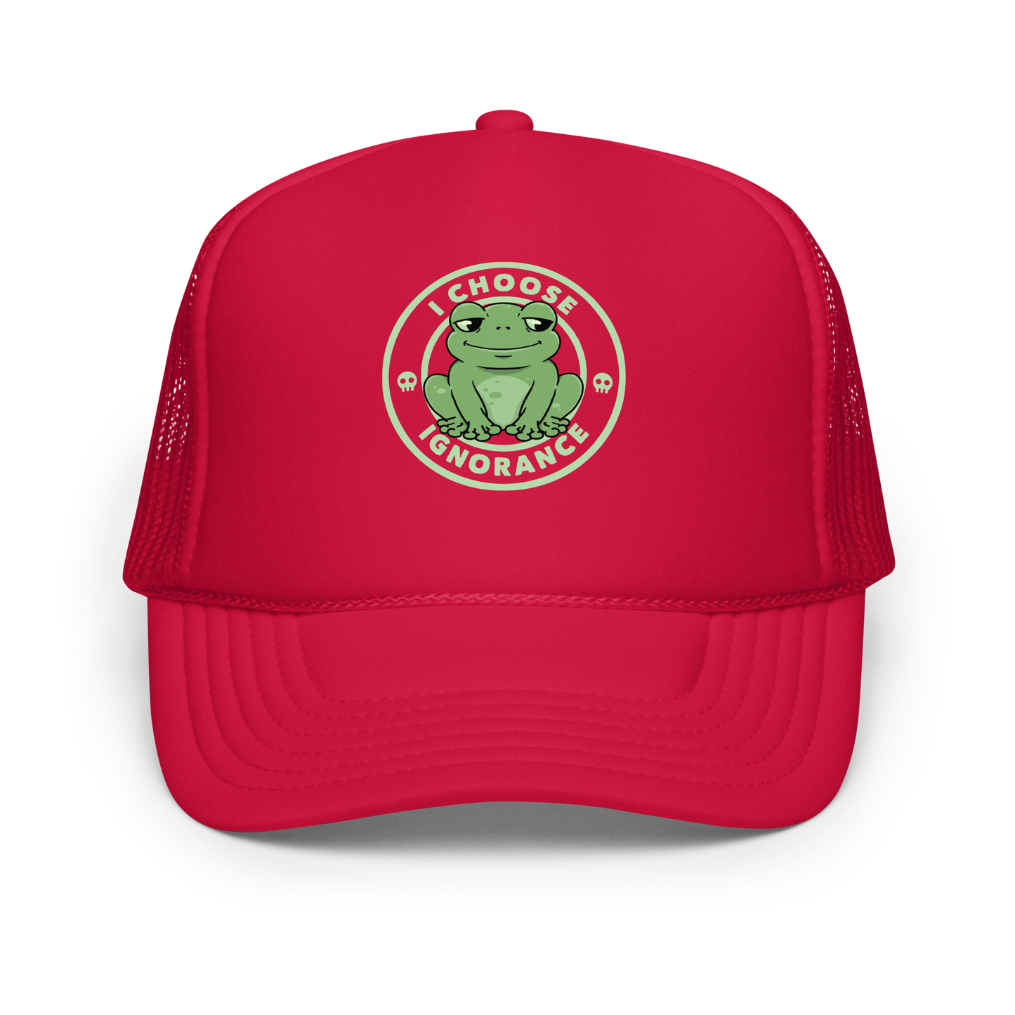 The image shows a cartoonish green frog with a sly smile, sitting with legs splayed out. Around it, the phrase 'I CHOOSE IGNORANCE' is written in bold letters. Two small skull designs are included, one on each side of the frog. The style is playful and ironic, blending elements of humor and rebellion.