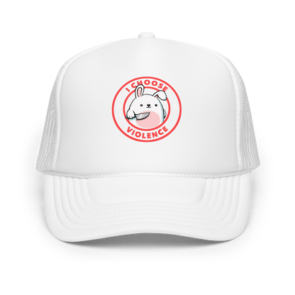 A cute white cartoon bunny with a pink belly stands holding a large kitchen knife in one paw. Surrounding the bunny is a red circular border with the words 'I CHOOSE VIOLENCE'. Small skull icons are on either side of the circle. The overall tone is a mix of adorable and ironic humor.