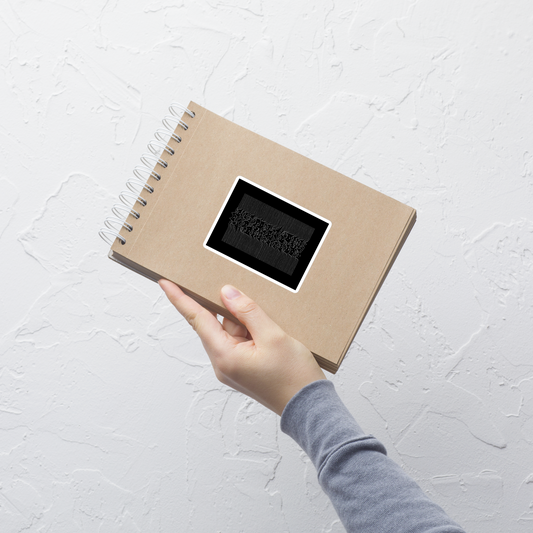 The drawing is a series of continuous wavy lines forming a pattern reminiscent of sound waves or topographic maps, but with an unexpected twist: the lines create the shapes of numerous cat faces stacked vertically. Each cat has simple, expressive features with pointed ears, adding a whimsical element to the otherwise structured pattern.