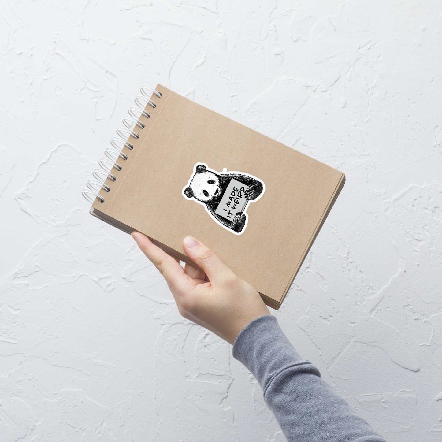A cute panda holding a sign that reads ‘I Made It Weird’. A playful, self-aware design for anyone who proudly embraces awkward energy and offbeat humour. Perfect for fans of quirky art and relatable chaos.