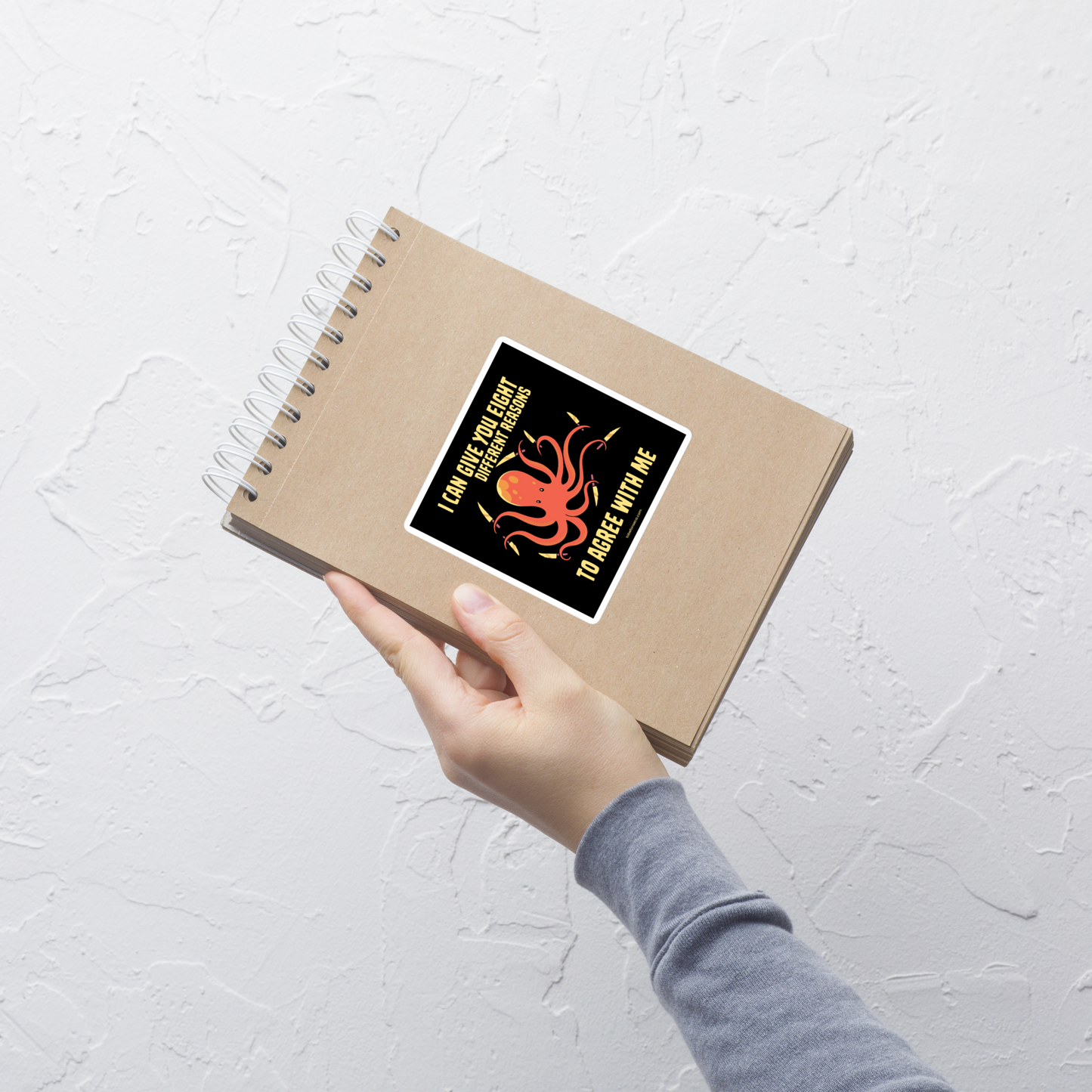 A mischievous orange octopus holding a knife in each tentacle alongside the phrase “I Can Give You Eight Different Reasons To Agree With Me.” A bold, dark-humor design perfect for those with a short fuse and a sharp sense of sarcasm.