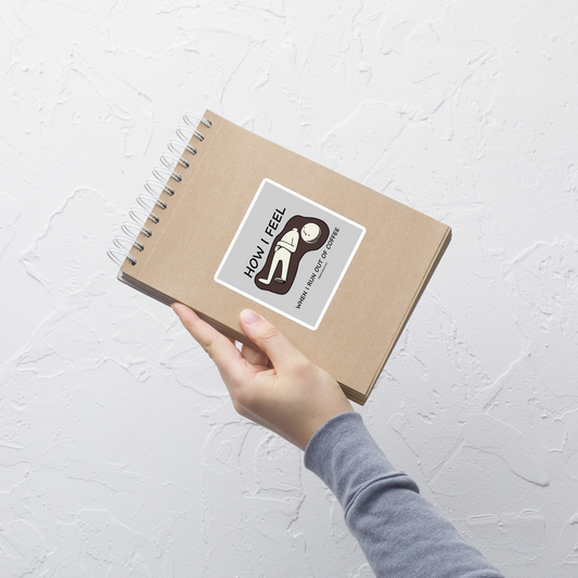 A minimalist doll character lying on the floor in a puddle of coffee, its head separated from its body, its expression saying it all, accompanied by the phrase 'How I Feel When I Run Out Of Coffee'. A darkly humorous design for anyone who feels completely lost without their daily dose of coffee.