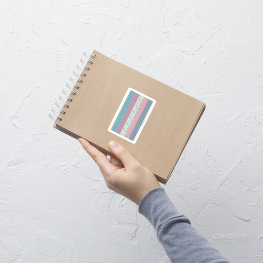 The transgender pride flag reimagined with a variety of textures across each stripe, creating a vibrant artistic take on this iconic symbol. A celebration of pride, visibility, inclusion, and self-expression.