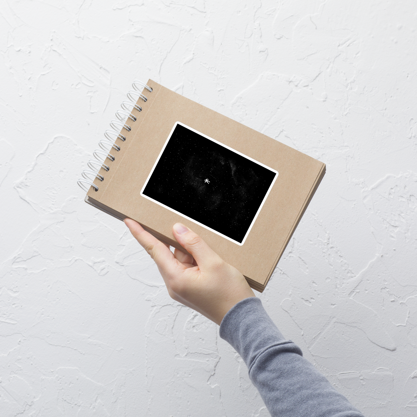 A small astronaut floating through space between the immensity of the universe and the stars. A perfect minimalist art for those who are passionate about space.