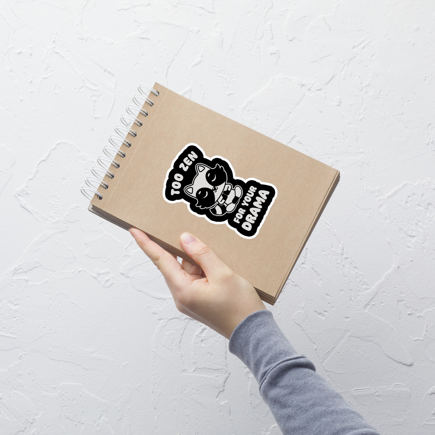 A cute raccoon sitting in a lotus meditation pose, accompanied by the phrase ‘Too Zen For Your Drama Cute Raccoon’. A playful and humorous design for raccoon lovers who prefer peace over unnecessary drama.