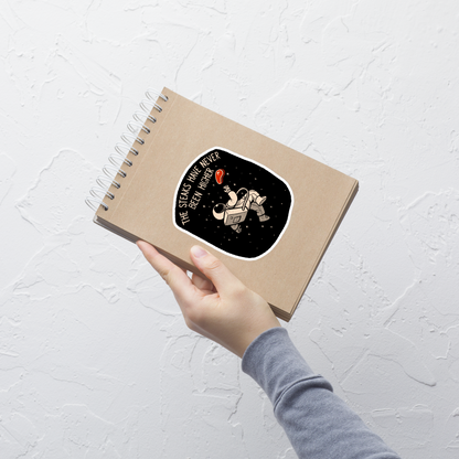 An astronaut floating through space with a small steak in front of him, paired with the phrase ‘The Steaks Have Never Been Higher’. A playful and humorous design that blends space exploration with a clever visual pun. Perfect for fans of witty wordplay and quirky art.