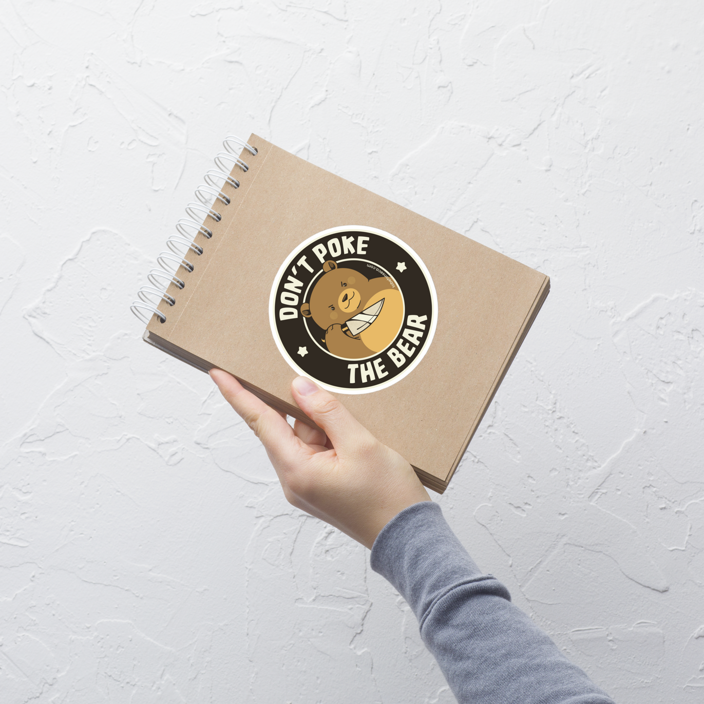 A cute bear with a dark twist, holding a knife and surrounded by the phrase “Don’t Poke The Bear”. This edgy yet adorable design plays with the contrast between sweetness and menace, making it perfect for fans of dark humour, bold artwork and ironic animal illustrations.