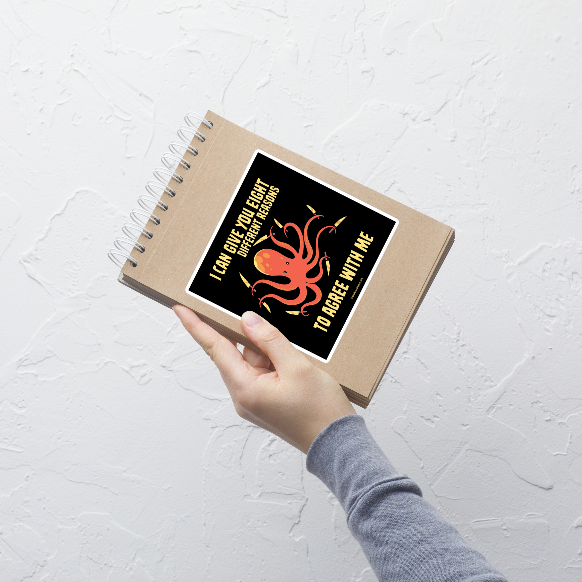 A mischievous orange octopus holding a knife in each tentacle alongside the phrase “I Can Give You Eight Different Reasons To Agree With Me.” A bold, dark-humor design perfect for those with a short fuse and a sharp sense of sarcasm.