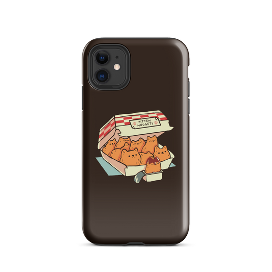 A box of cute nuggets that are shaped like cute kittens. An art that mixes humor, kittens and fast food.