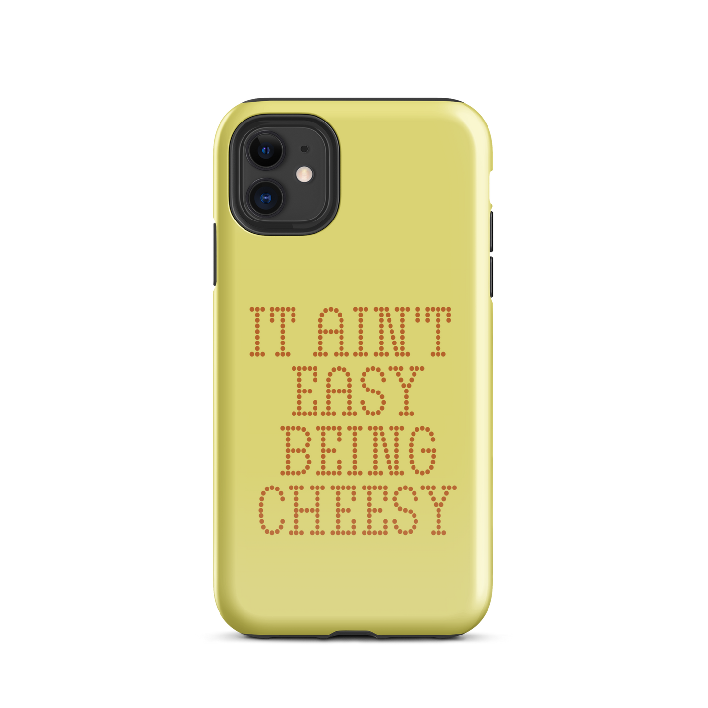 Bold dotted typography spells out ‘It Ain’t Easy Being Cheesy’ in a playful retro style on a yellow background. This funny design mixes wordplay with foodie humor, perfect for pun lovers, cheese fans, retro humor enthusiasts, and anyone who embraces the cringe with pride. A great quirky gift for cheese lovers and humor fans alike.