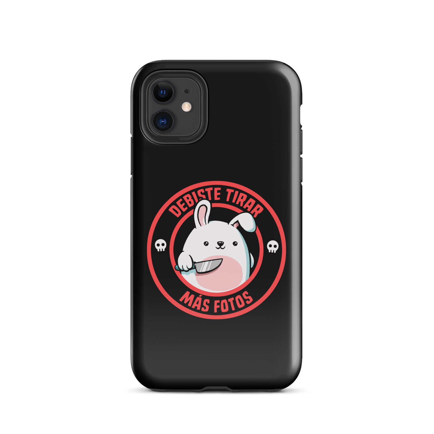 A cute white cartoon bunny with a pink belly stands holding a large kitchen knife in one paw. Surrounding the bunny is a red circular border with the words 'DEBISTE TIRAR MÁS FOTOS'. Small skull icons are on either side of the circle. The overall tone is a mix of adorable and ironic humor.