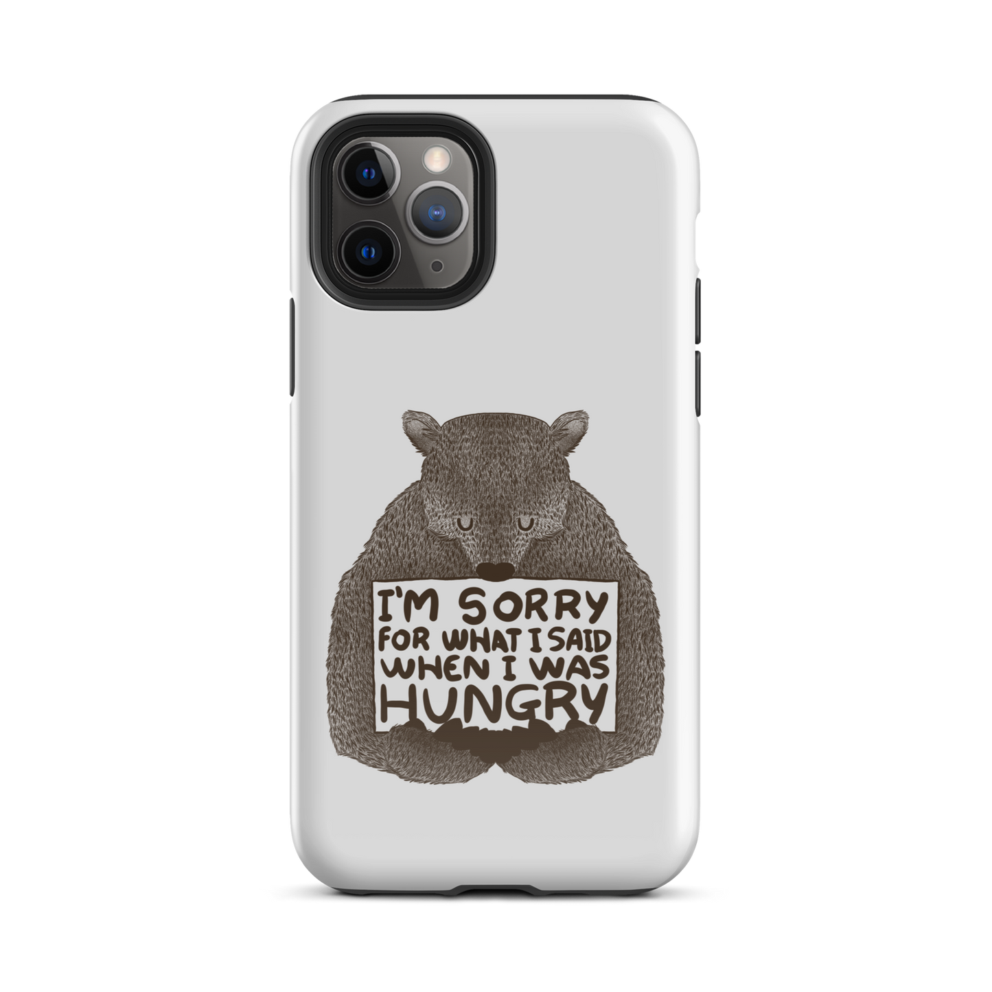 The image shows a humorous, detailed illustration of a bear, drawn in a hand-drawn style, holding a sign that reads 'I'm sorry for what I said when I was hungry.' The bear appears to be apologizing in a comical, endearing manner, making it a relatable and light-hearted design.