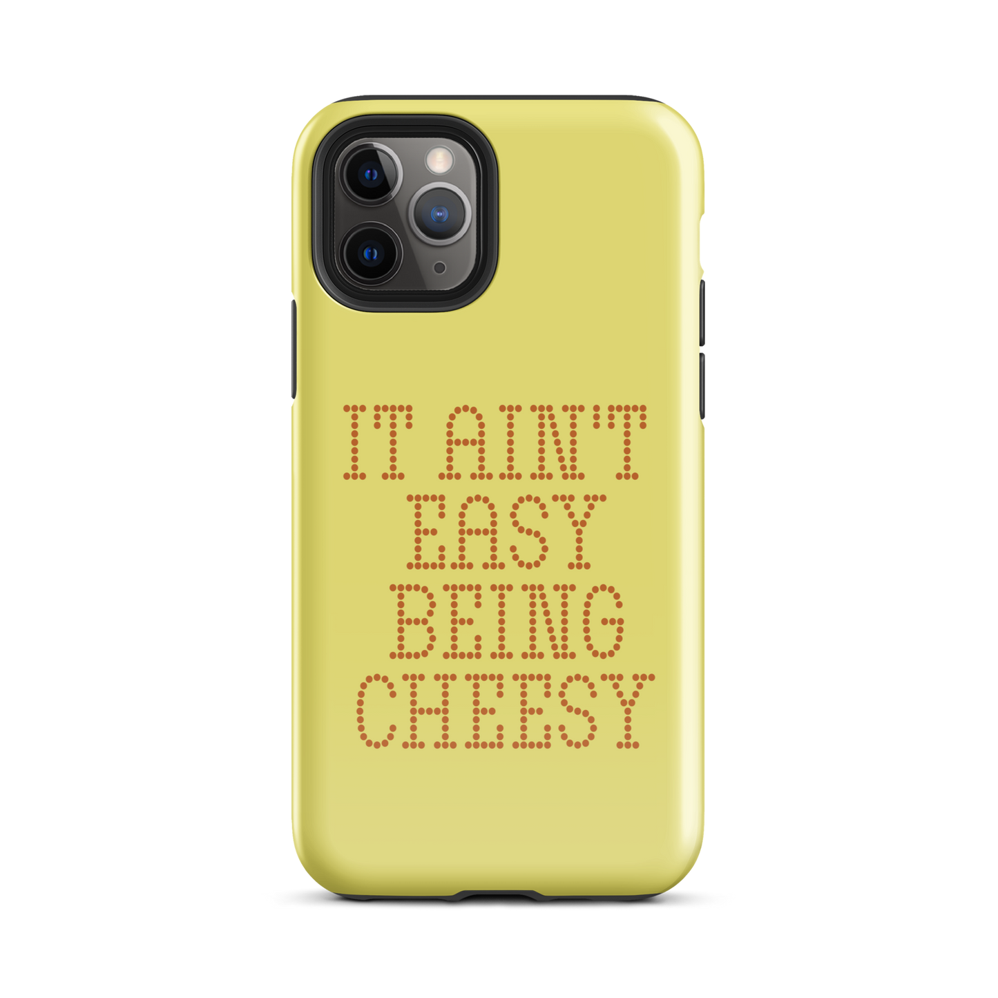Bold dotted typography spells out ‘It Ain’t Easy Being Cheesy’ in a playful retro style on a yellow background. This funny design mixes wordplay with foodie humor, perfect for pun lovers, cheese fans, retro humor enthusiasts, and anyone who embraces the cringe with pride. A great quirky gift for cheese lovers and humor fans alike.