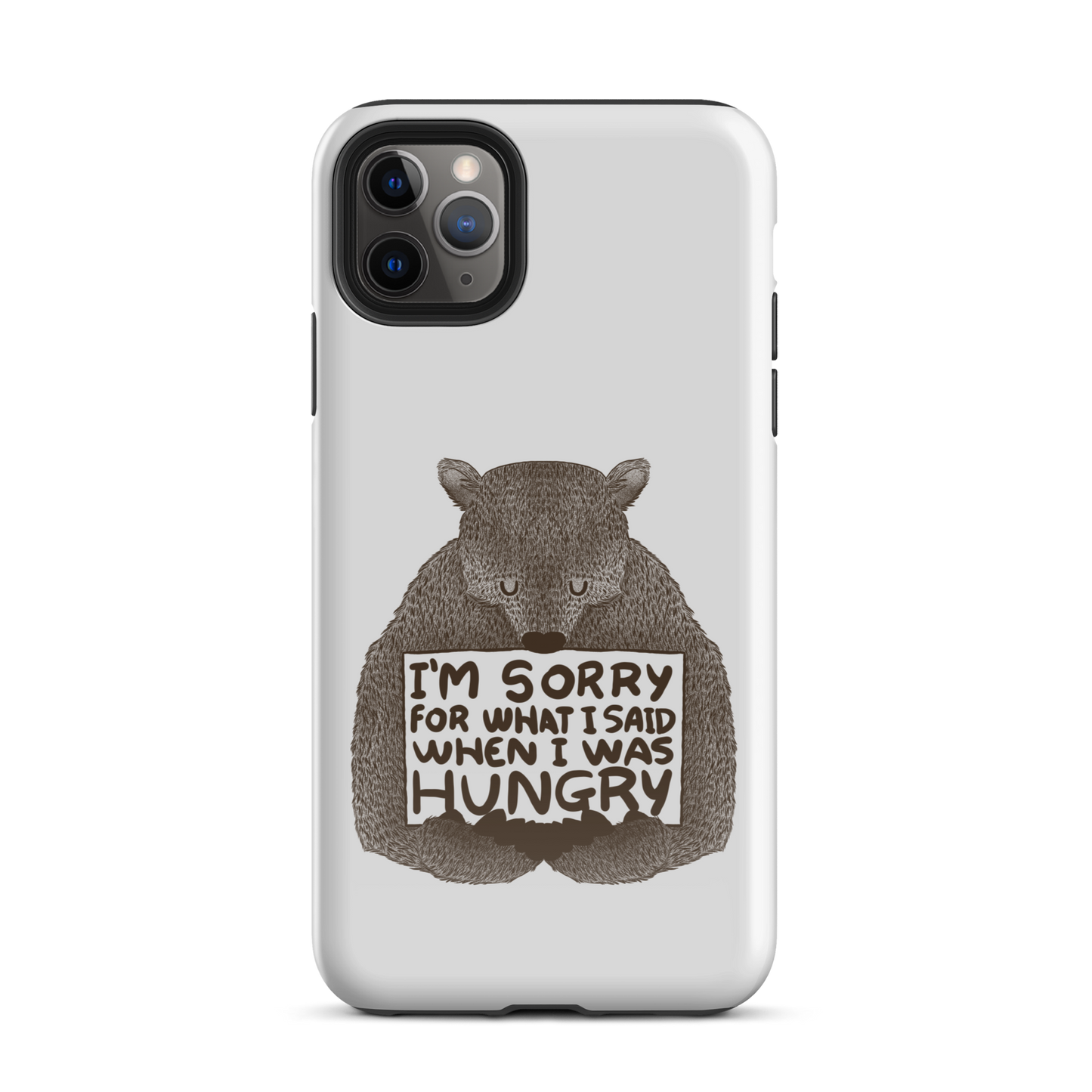 The image shows a humorous, detailed illustration of a bear, drawn in a hand-drawn style, holding a sign that reads 'I'm sorry for what I said when I was hungry.' The bear appears to be apologizing in a comical, endearing manner, making it a relatable and light-hearted design.