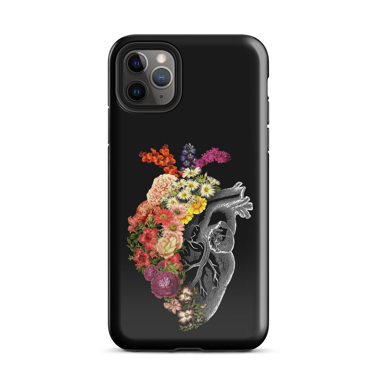 The design is an intricate and anatomical drawing of a human heart on a black background. The left side of the heart morphs into a vibrant assortment of colorful flowers, including roses, daisies, and other blooming blossoms, creating a striking contrast between the realistic and the surreal, symbolizing the harmony between nature and humanity.