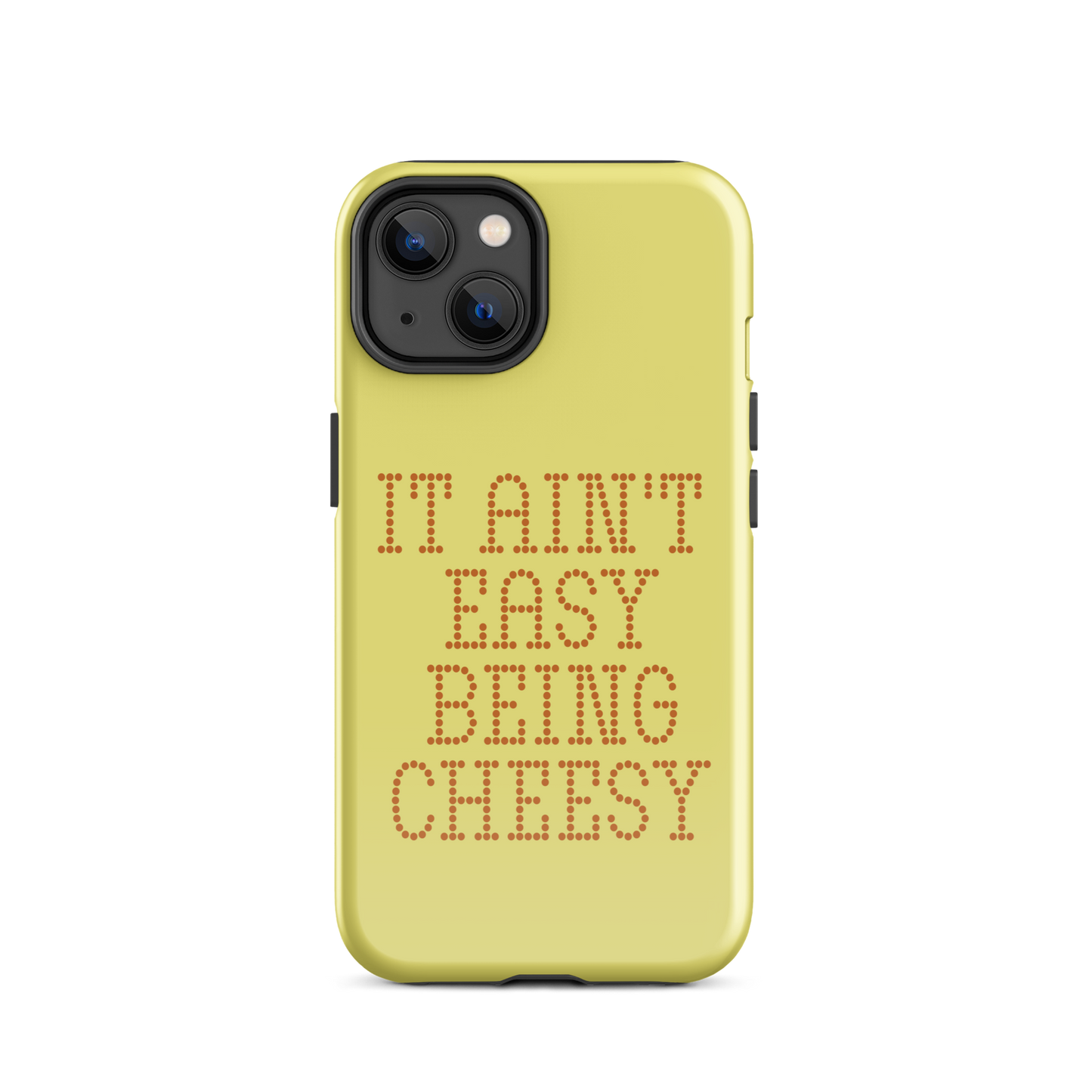 Bold dotted typography spells out ‘It Ain’t Easy Being Cheesy’ in a playful retro style on a yellow background. This funny design mixes wordplay with foodie humor, perfect for pun lovers, cheese fans, retro humor enthusiasts, and anyone who embraces the cringe with pride. A great quirky gift for cheese lovers and humor fans alike.