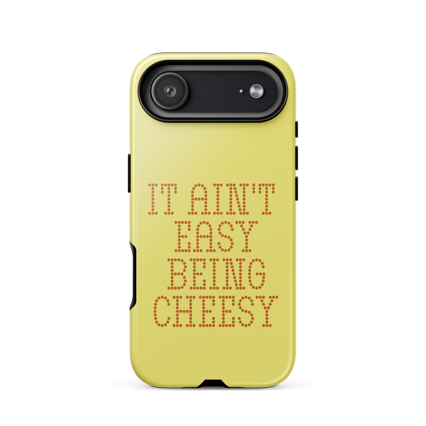 Bold dotted typography spells out ‘It Ain’t Easy Being Cheesy’ in a playful retro style on a yellow background. This funny design mixes wordplay with foodie humor, perfect for pun lovers, cheese fans, retro humor enthusiasts, and anyone who embraces the cringe with pride. A great quirky gift for cheese lovers and humor fans alike.