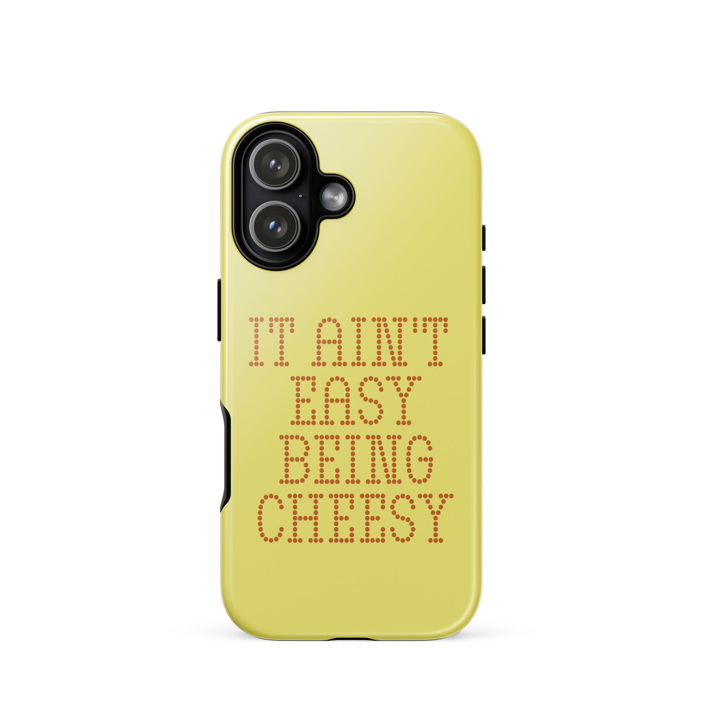 Bold dotted typography spells out ‘It Ain’t Easy Being Cheesy’ in a playful retro style on a yellow background. This funny design mixes wordplay with foodie humor, perfect for pun lovers, cheese fans, retro humor enthusiasts, and anyone who embraces the cringe with pride. A great quirky gift for cheese lovers and humor fans alike.