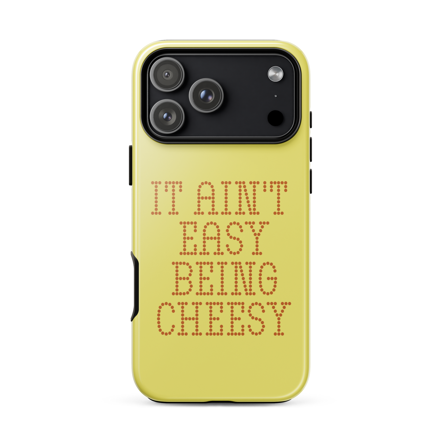 Bold dotted typography spells out ‘It Ain’t Easy Being Cheesy’ in a playful retro style on a yellow background. This funny design mixes wordplay with foodie humor, perfect for pun lovers, cheese fans, retro humor enthusiasts, and anyone who embraces the cringe with pride. A great quirky gift for cheese lovers and humor fans alike.