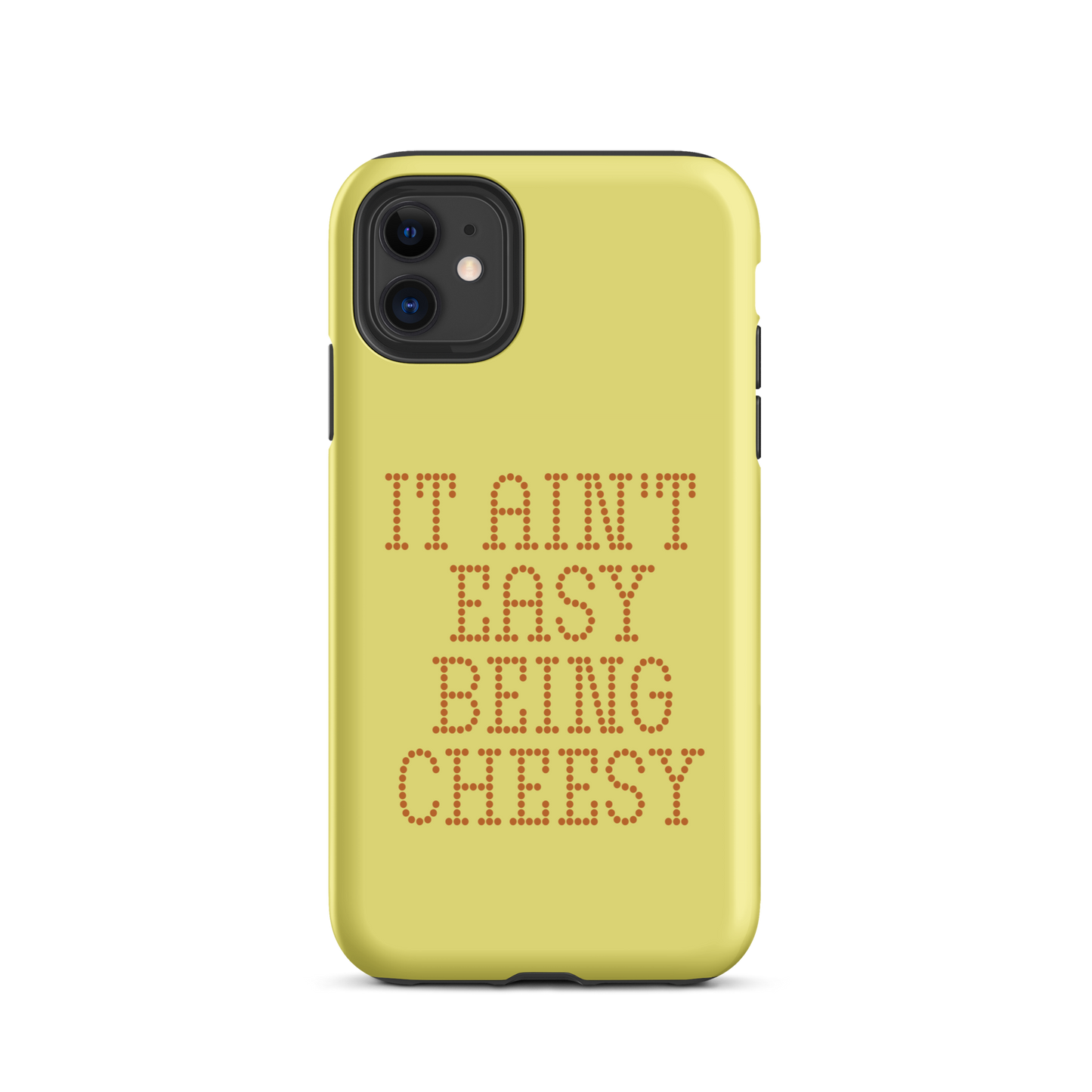 Bold dotted typography spells out ‘It Ain’t Easy Being Cheesy’ in a playful retro style on a yellow background. This funny design mixes wordplay with foodie humor, perfect for pun lovers, cheese fans, retro humor enthusiasts, and anyone who embraces the cringe with pride. A great quirky gift for cheese lovers and humor fans alike.