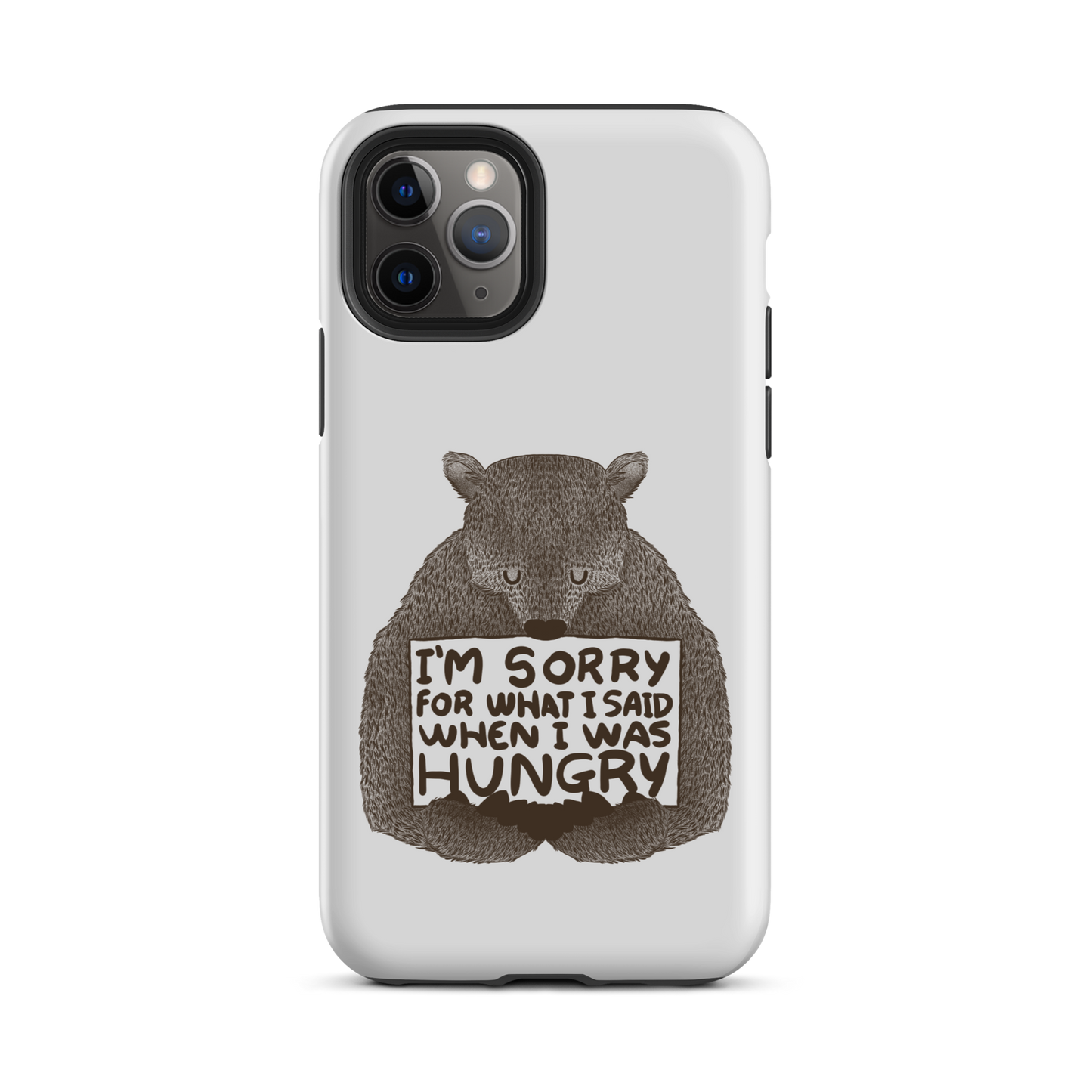 The image shows a humorous, detailed illustration of a bear, drawn in a hand-drawn style, holding a sign that reads 'I'm sorry for what I said when I was hungry.' The bear appears to be apologizing in a comical, endearing manner, making it a relatable and light-hearted design.