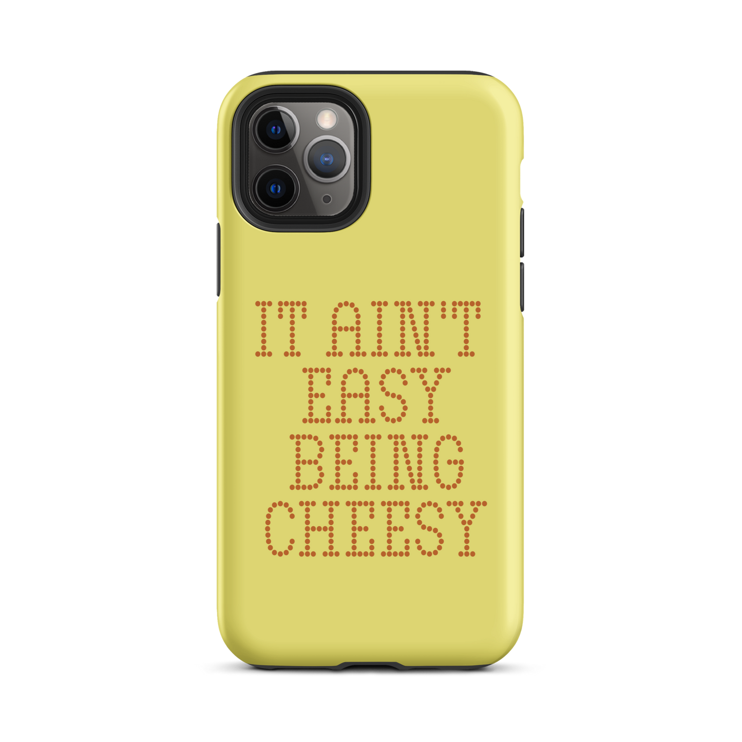 Bold dotted typography spells out ‘It Ain’t Easy Being Cheesy’ in a playful retro style on a yellow background. This funny design mixes wordplay with foodie humor, perfect for pun lovers, cheese fans, retro humor enthusiasts, and anyone who embraces the cringe with pride. A great quirky gift for cheese lovers and humor fans alike.