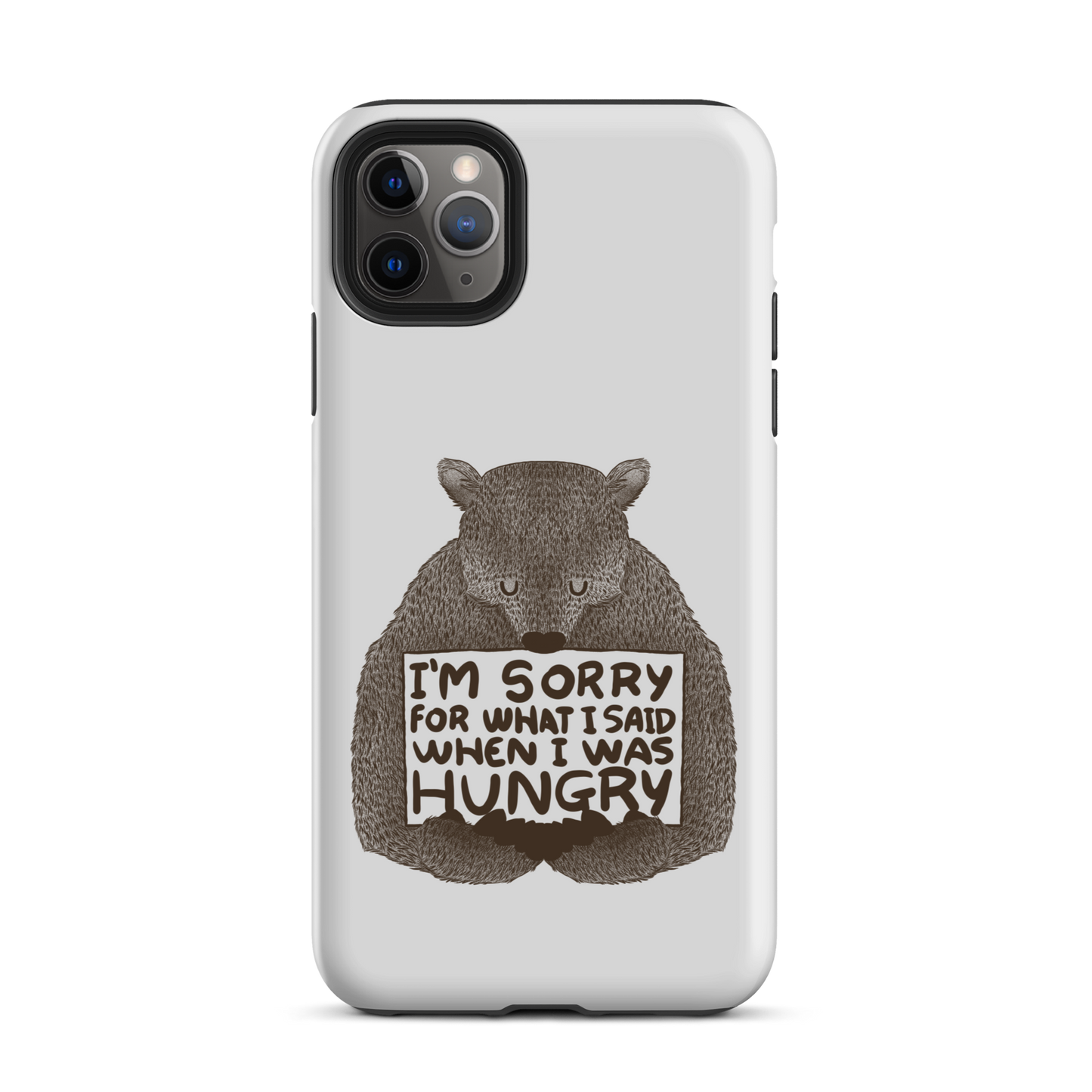 The image shows a humorous, detailed illustration of a bear, drawn in a hand-drawn style, holding a sign that reads 'I'm sorry for what I said when I was hungry.' The bear appears to be apologizing in a comical, endearing manner, making it a relatable and light-hearted design.