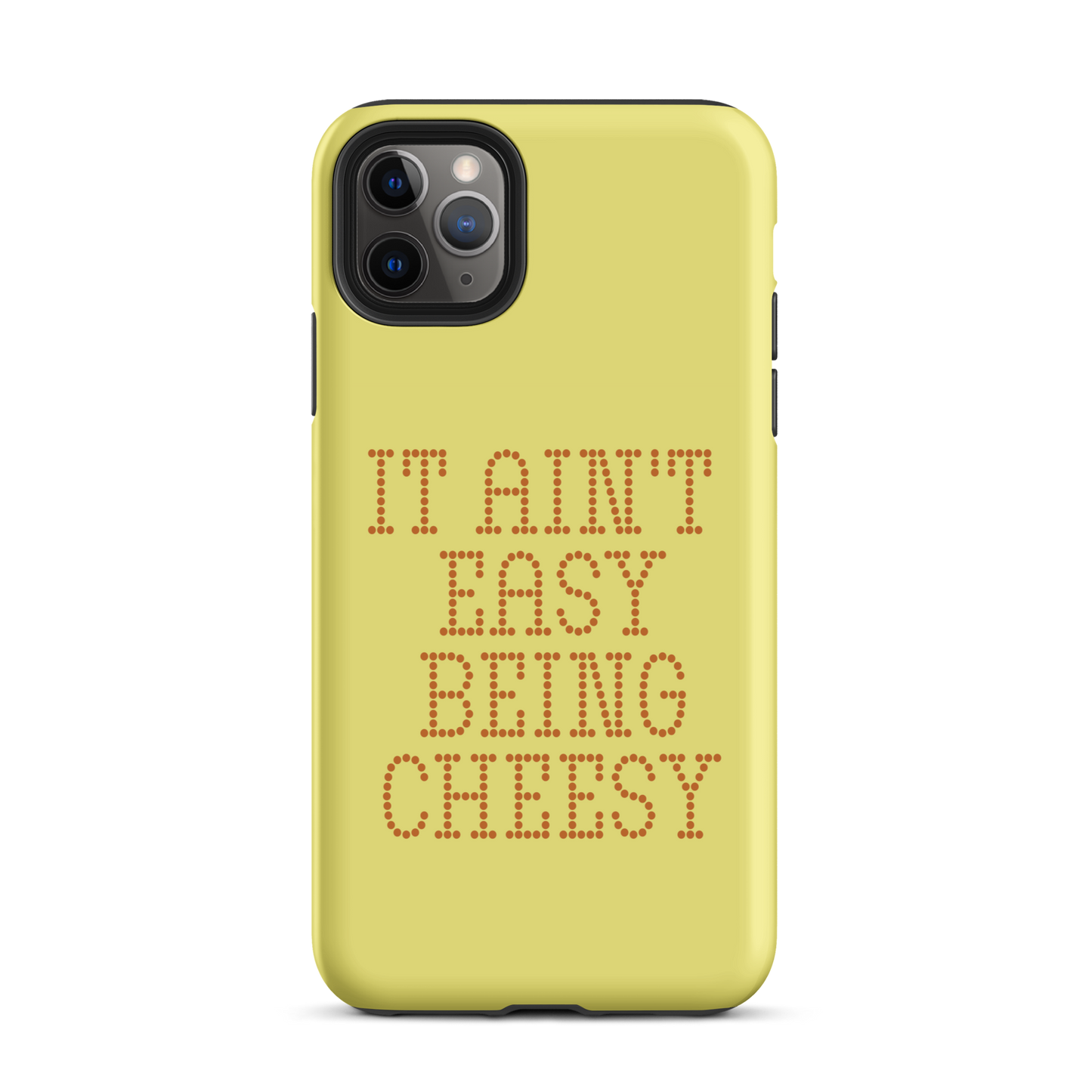 Bold dotted typography spells out ‘It Ain’t Easy Being Cheesy’ in a playful retro style on a yellow background. This funny design mixes wordplay with foodie humor, perfect for pun lovers, cheese fans, retro humor enthusiasts, and anyone who embraces the cringe with pride. A great quirky gift for cheese lovers and humor fans alike.