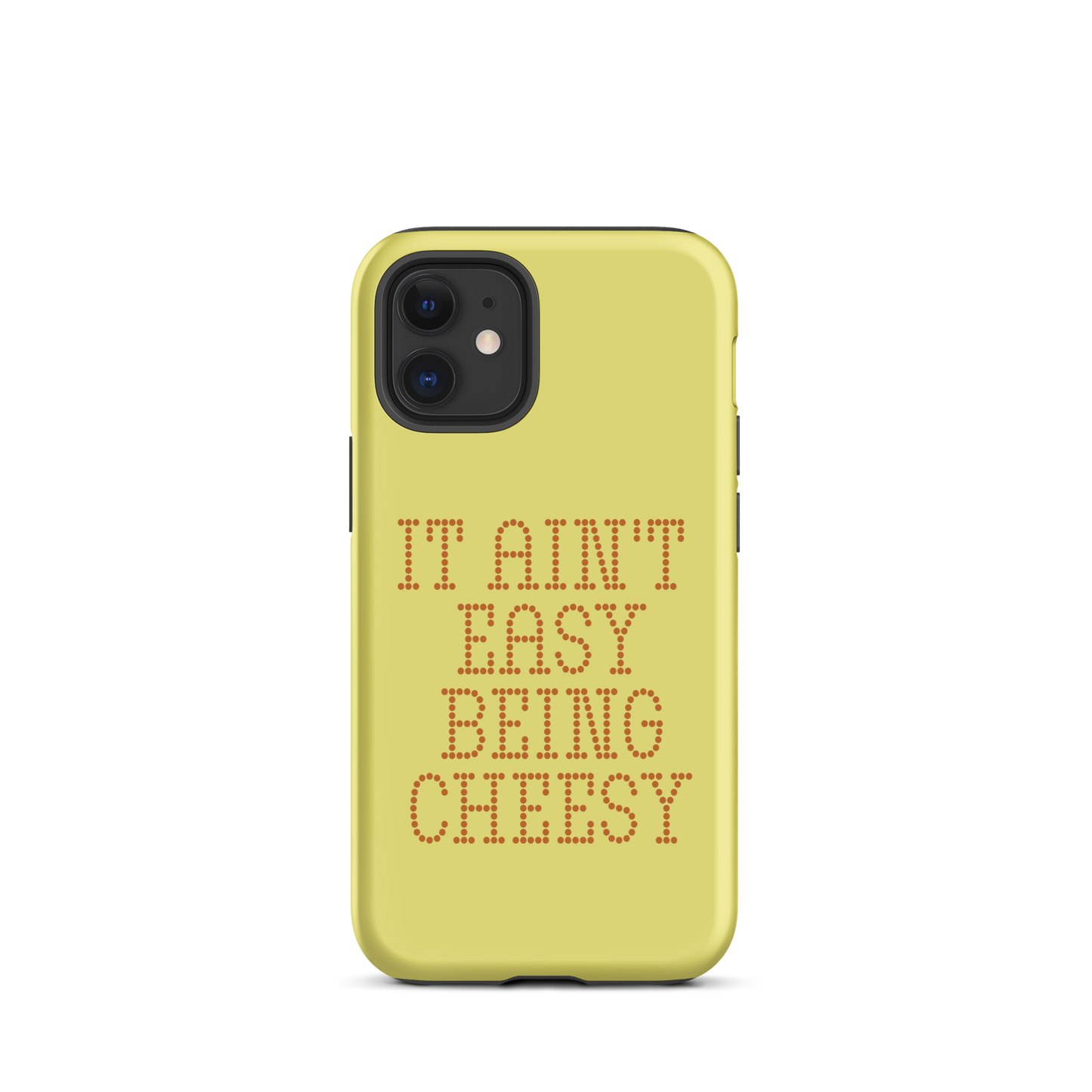 Bold dotted typography spells out ‘It Ain’t Easy Being Cheesy’ in a playful retro style on a yellow background. This funny design mixes wordplay with foodie humor, perfect for pun lovers, cheese fans, retro humor enthusiasts, and anyone who embraces the cringe with pride. A great quirky gift for cheese lovers and humor fans alike.