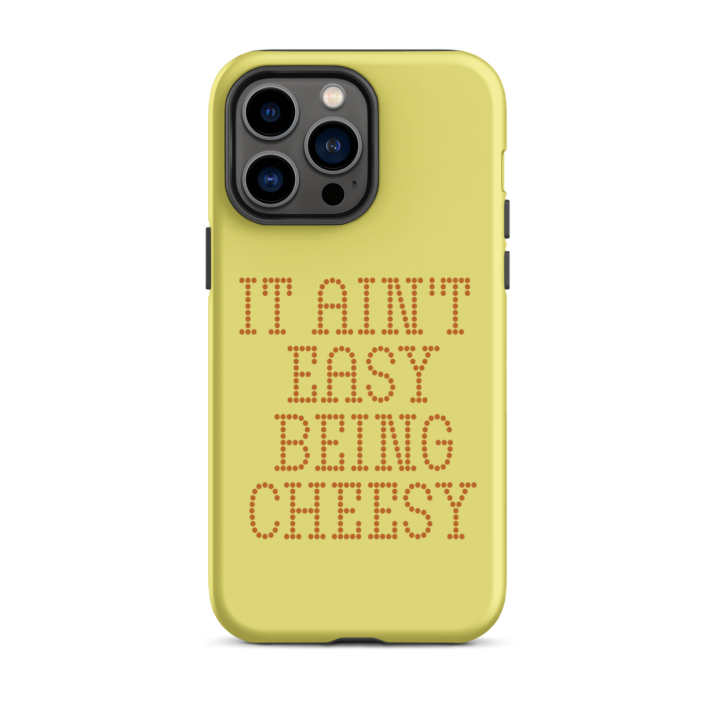 Bold dotted typography spells out ‘It Ain’t Easy Being Cheesy’ in a playful retro style on a yellow background. This funny design mixes wordplay with foodie humor, perfect for pun lovers, cheese fans, retro humor enthusiasts, and anyone who embraces the cringe with pride. A great quirky gift for cheese lovers and humor fans alike.