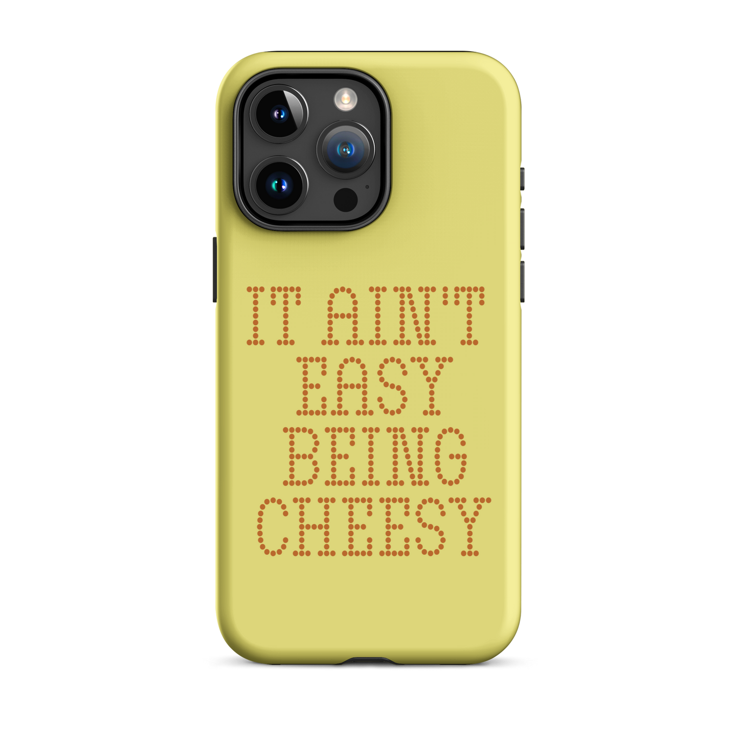 Bold dotted typography spells out ‘It Ain’t Easy Being Cheesy’ in a playful retro style on a yellow background. This funny design mixes wordplay with foodie humor, perfect for pun lovers, cheese fans, retro humor enthusiasts, and anyone who embraces the cringe with pride. A great quirky gift for cheese lovers and humor fans alike.