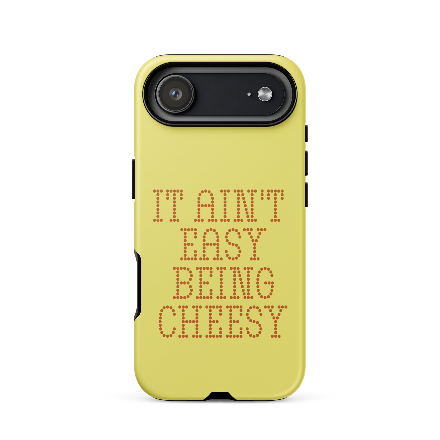 Bold dotted typography spells out ‘It Ain’t Easy Being Cheesy’ in a playful retro style on a yellow background. This funny design mixes wordplay with foodie humor, perfect for pun lovers, cheese fans, retro humor enthusiasts, and anyone who embraces the cringe with pride. A great quirky gift for cheese lovers and humor fans alike.