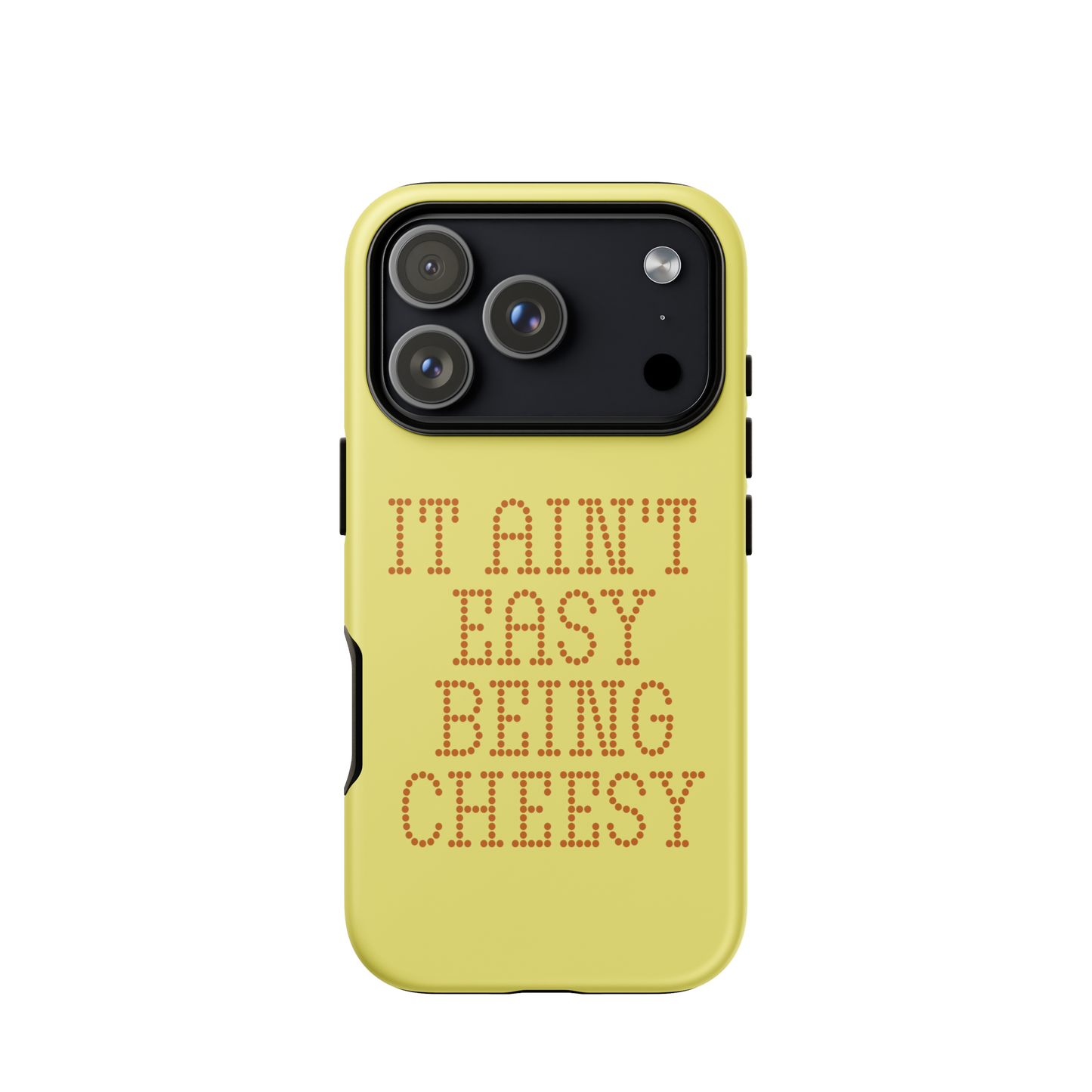 Bold dotted typography spells out ‘It Ain’t Easy Being Cheesy’ in a playful retro style on a yellow background. This funny design mixes wordplay with foodie humor, perfect for pun lovers, cheese fans, retro humor enthusiasts, and anyone who embraces the cringe with pride. A great quirky gift for cheese lovers and humor fans alike.