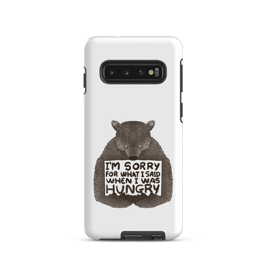 The image shows a humorous, detailed illustration of a bear, drawn in a hand-drawn style, holding a sign that reads 'I'm sorry for what I said when I was hungry.' The bear appears to be apologizing in a comical, endearing manner, making it a relatable and light-hearted design.