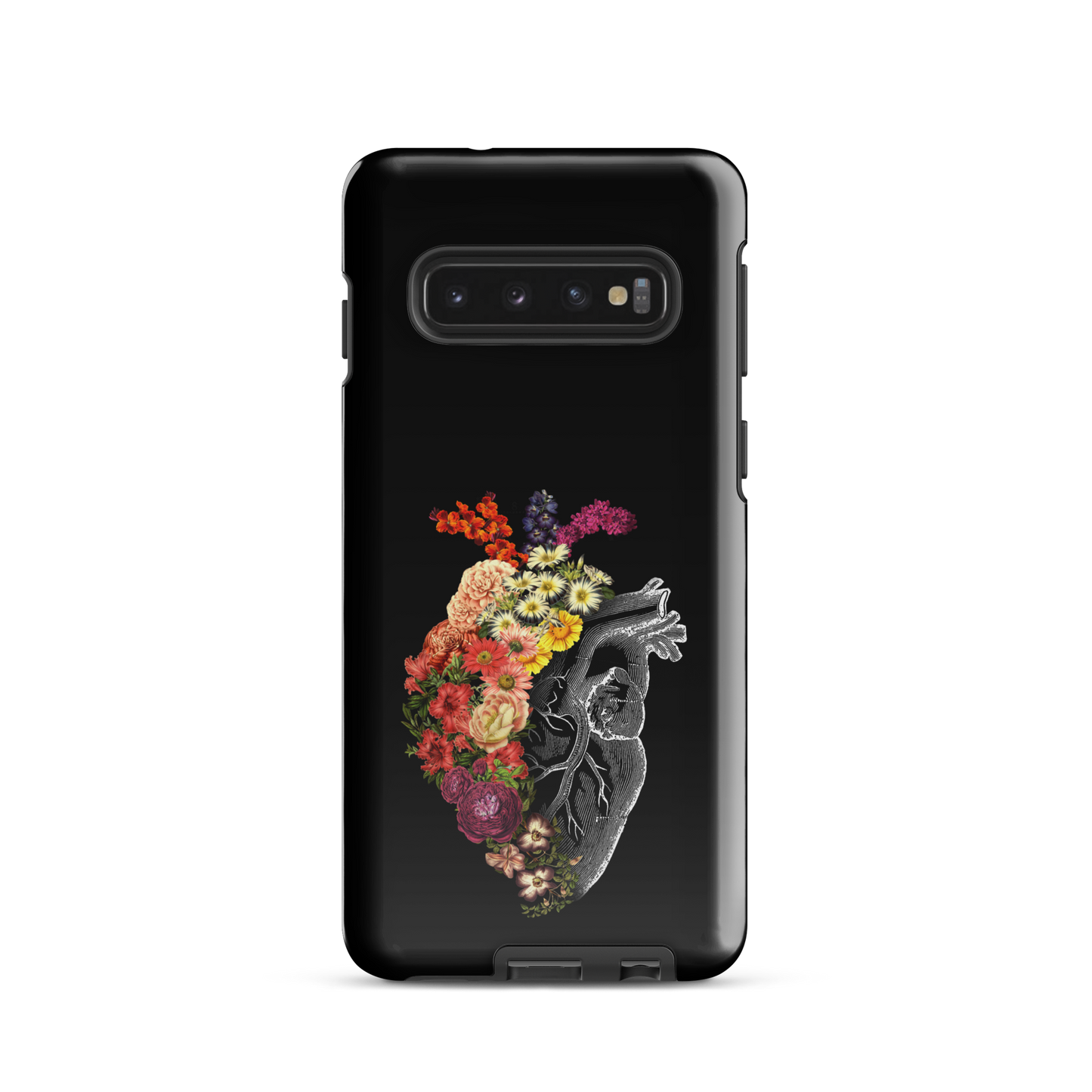 The design is an intricate and anatomical drawing of a human heart on a black background. The left side of the heart morphs into a vibrant assortment of colorful flowers, including roses, daisies, and other blooming blossoms, creating a striking contrast between the realistic and the surreal, symbolizing the harmony between nature and humanity.